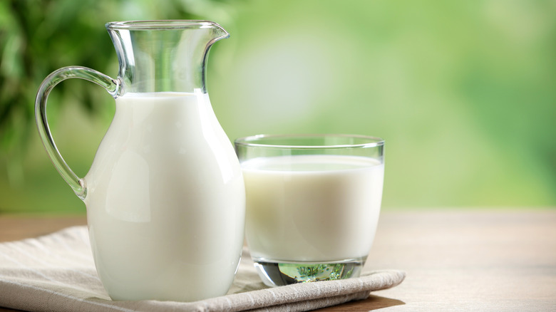 jug of milk on wooden table