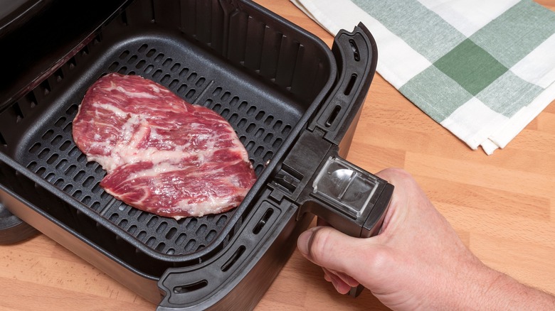 person air frying steak