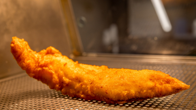 fried fish in takeout restaurant