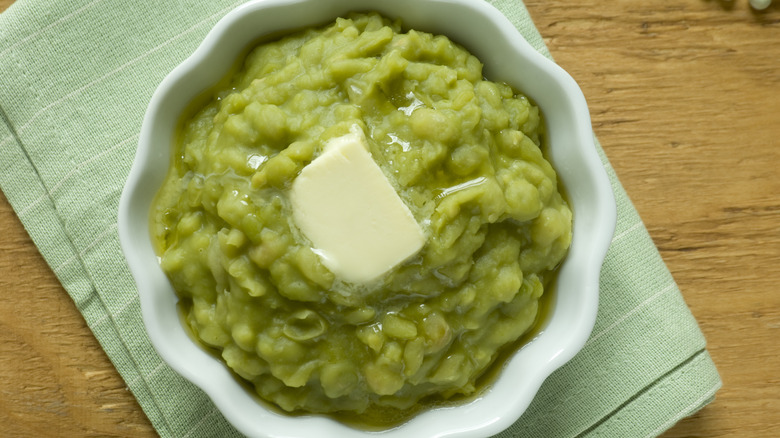 mushy peas with butter bowl