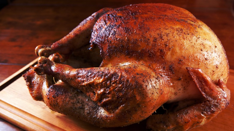 turkey resting on wooden board