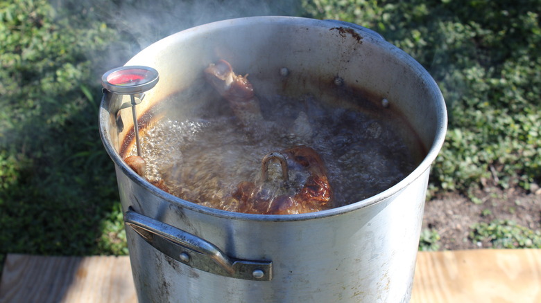 turkey deep-frying in a pot