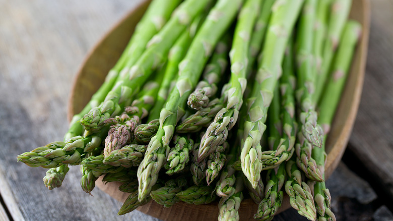 asparagus on wooden surface