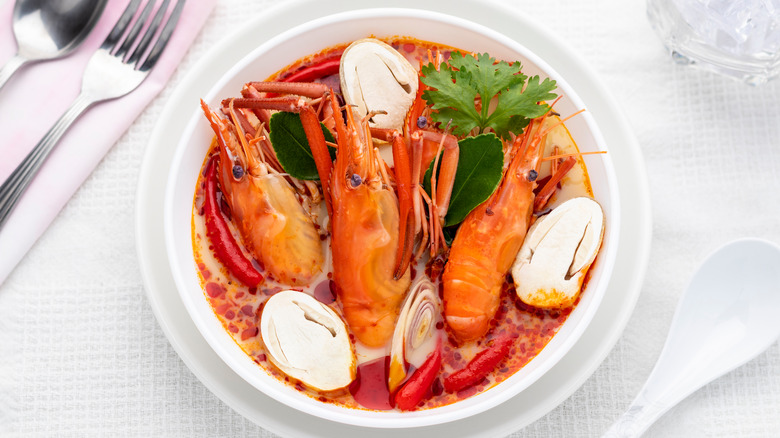 Bowl of soup with giant prawns