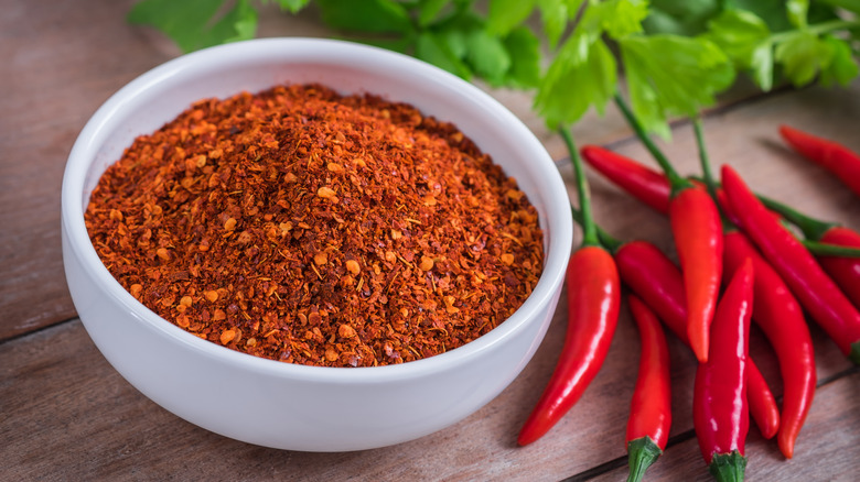 crushed and fresh cayenne peppers