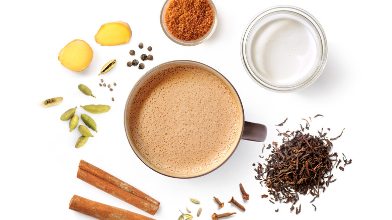 Chai spices surrounding warm beverage