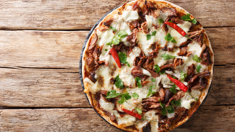 Pulled pork and red chili pizza