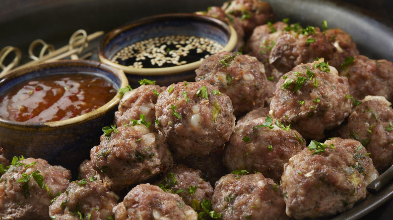 plate of meatballs and sauces