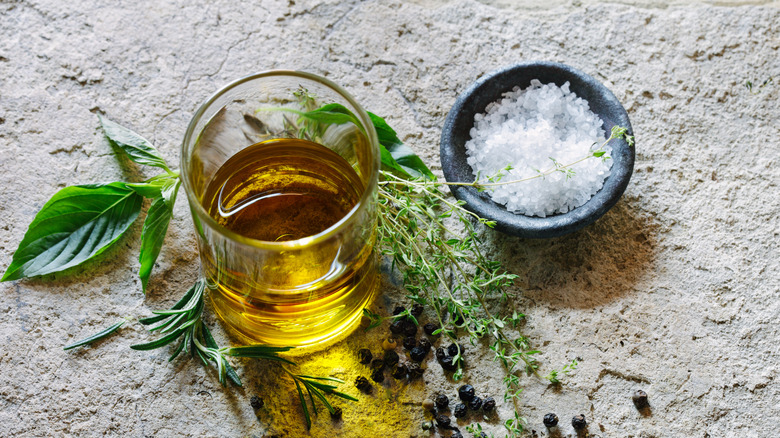 Olive oil and salt with herbs