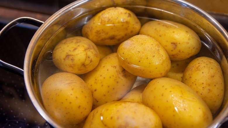 baked potatoes in water