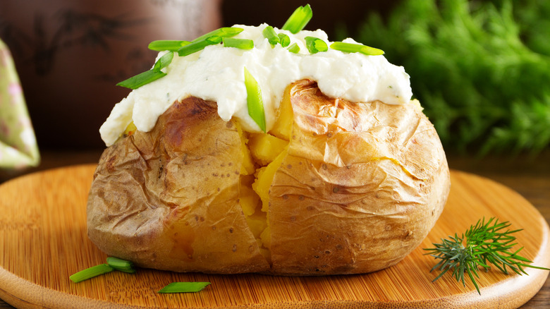 Baked potato topped with cheese