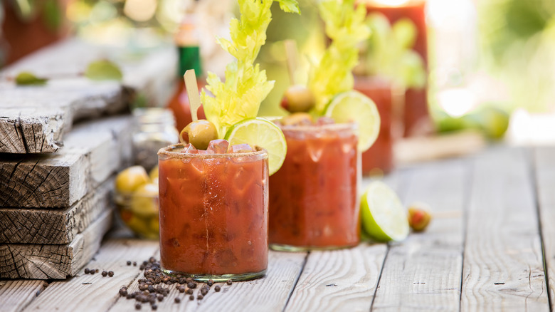 bloody mary's on wooden table