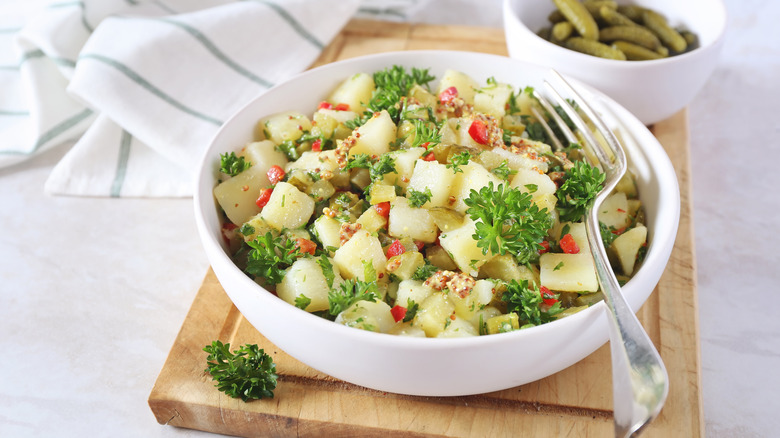 Potato salad with parsley in dish