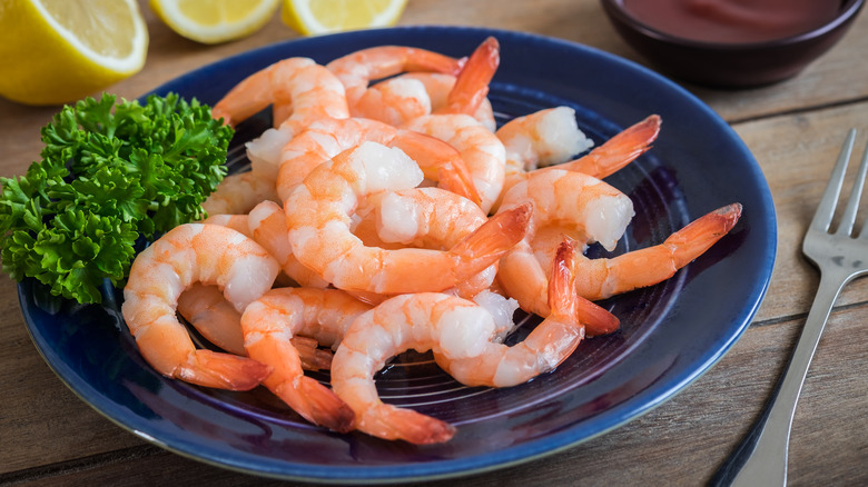 steamed shrimp on blue plate