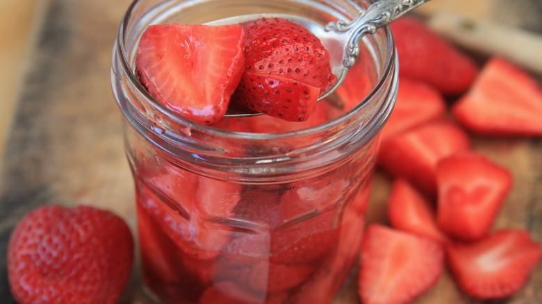 strawberries being marinated