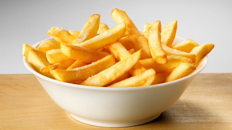 Fries in a white bowl