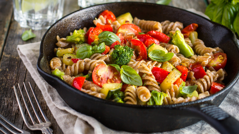 skillet with pasta and vegetables