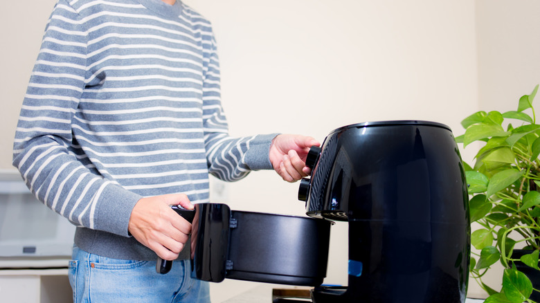 putting basket in air fryer