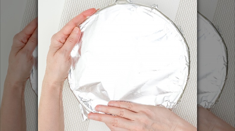 aluminum foil over pan