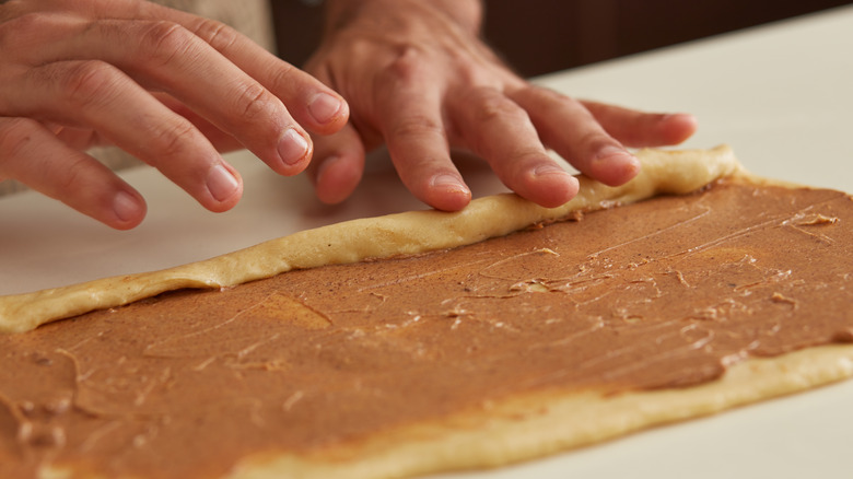 rolling cinnamon roll dough