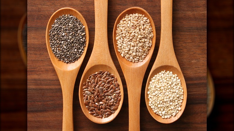 seeds in wooden spoons