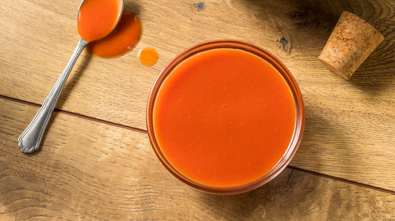 buffalo sauce and spoon