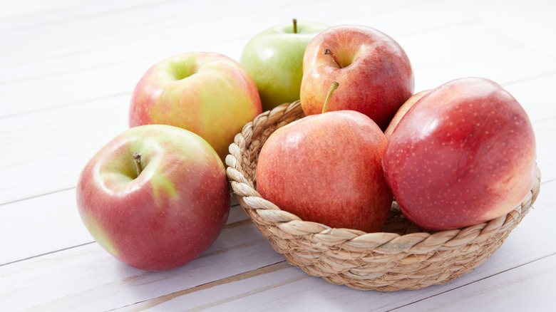 red apples in wicker basket