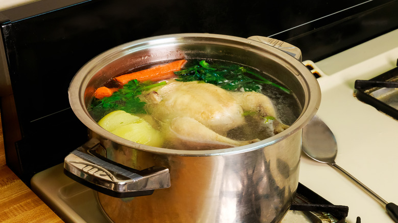 chicken broth makings in pot