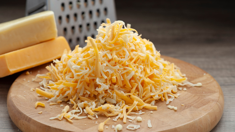 Shredded cheese and grater