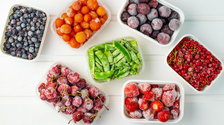 Frozen berries in plastic containers