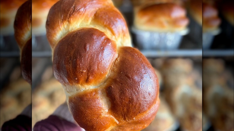 Challah bread in hand