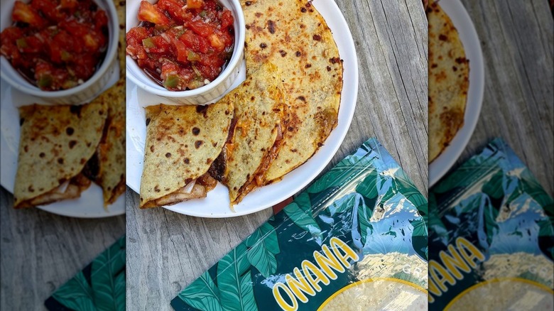 Tortillas on plate with salsa