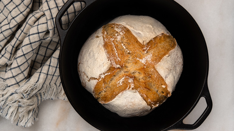 scored bread in dutch oven