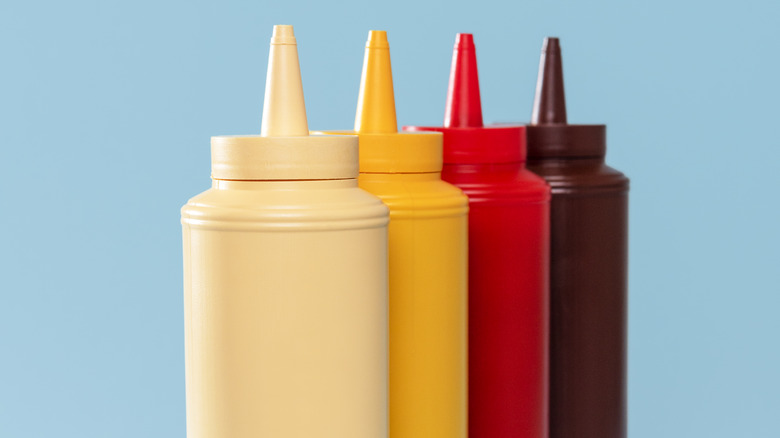 condiment bottles in a row