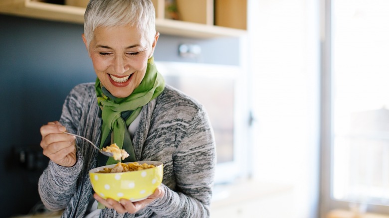 Woman eating cereal