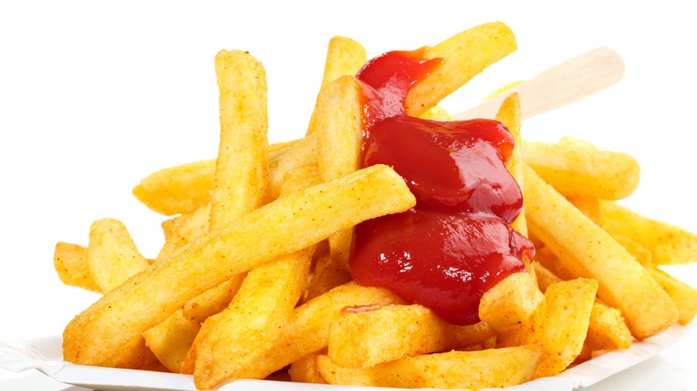 Plate of fries with ketchup