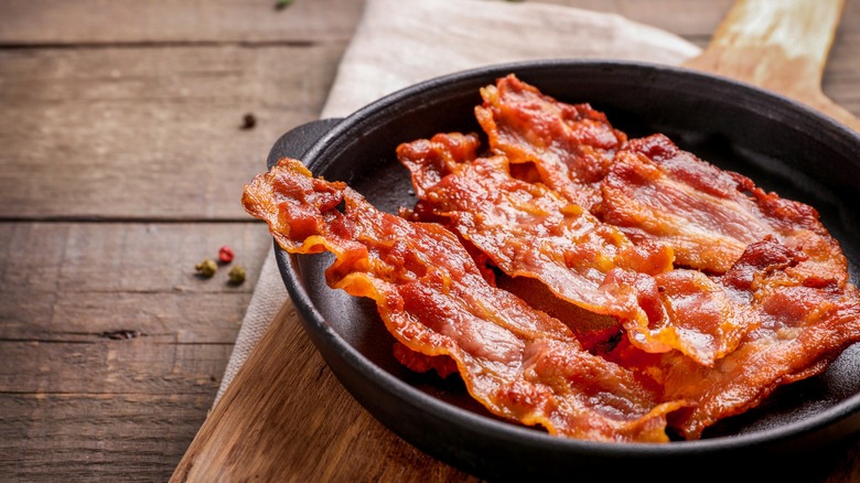 Crispy bacon in pan