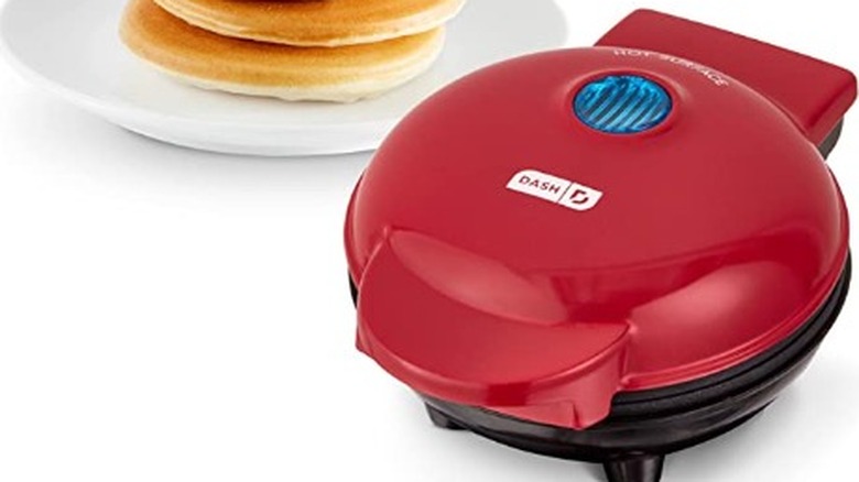 DASH Mini Maker griddle with pancakes