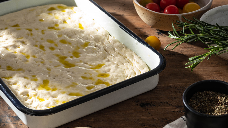 Dough in white baking dish