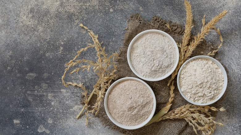 Three bowls of different flours