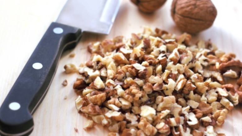 Chopped nuts and knife