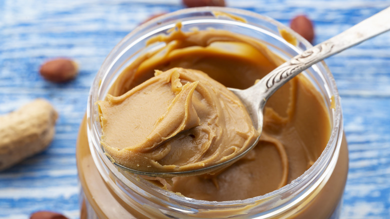 Peanut butter jar with spoon