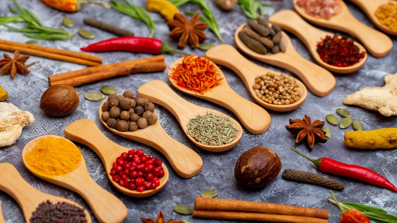 Spices on spoons and counter