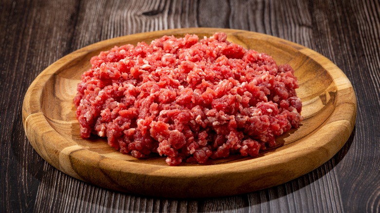 ground beef on wooden board