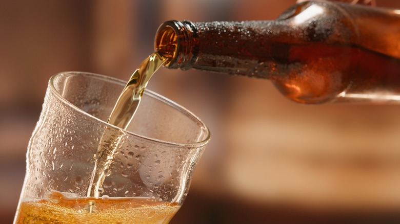 Beer being poured in glass