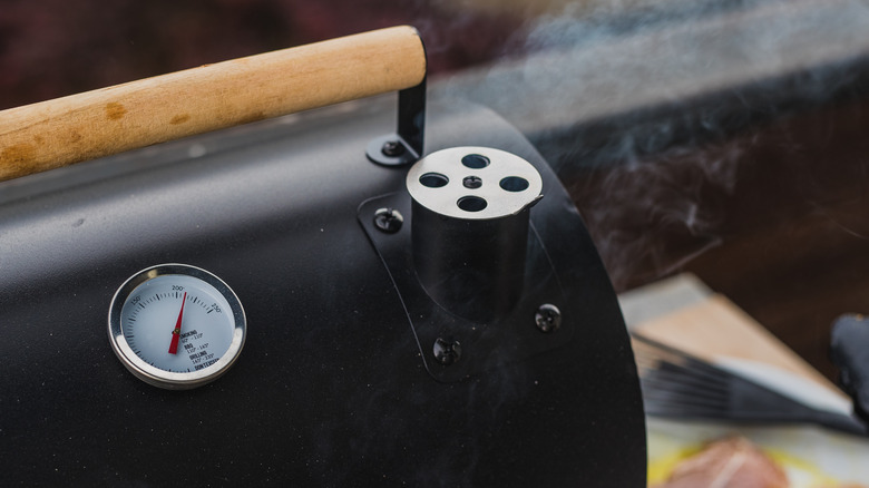 Meat smoker in use