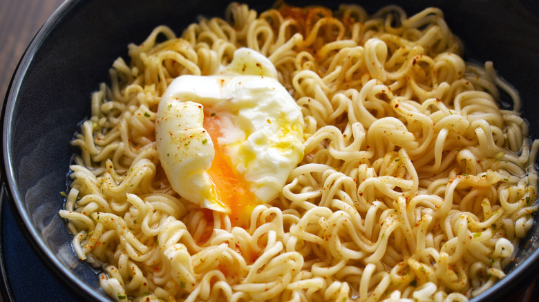 poached egg atop ramen noodles