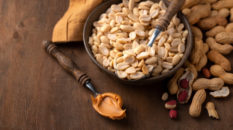 bowl of peanuts with spoon