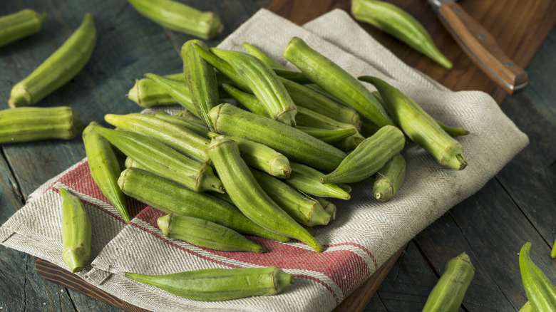 Fresh okra on linen