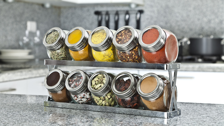 Different spices on spice rack